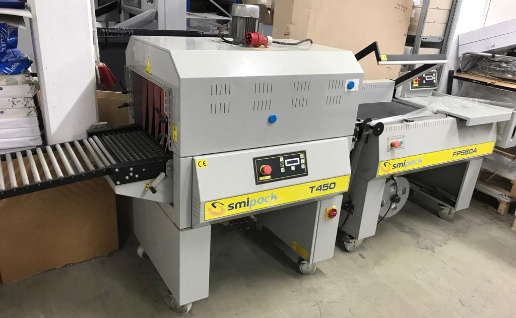 Smipack FP 560 A semi-automatic angle welder with Smipack T 450 single-chamber shrink tunnel - آلة التعبئة والتغليف: صورة 2 Smipack FP 560 A semi-automatic angle welder with Smipack T 450 single-chamber shrink tunnel - آلة التعبئة والتغليف: صورة 2