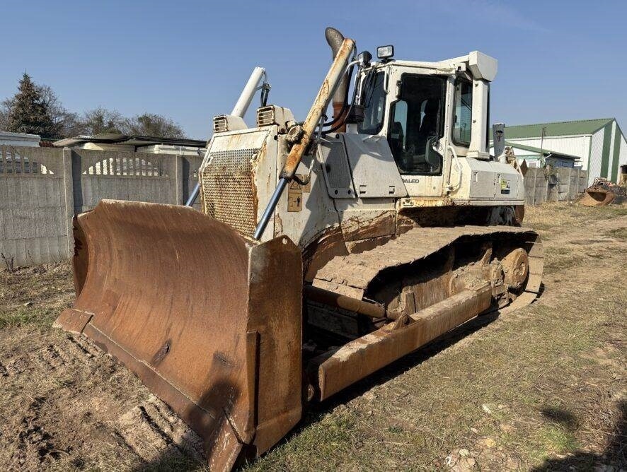 Komatsu D65EX-15e0 + ripper - بلدوزر: صورة 1 Komatsu D65EX-15e0 + ripper - بلدوزر: صورة 1