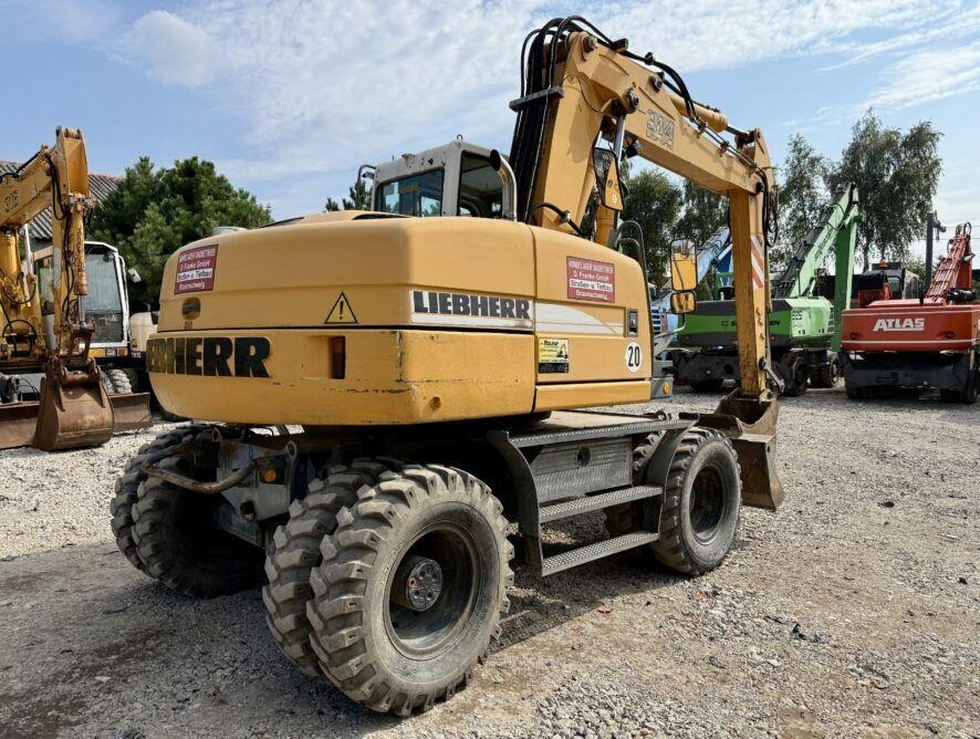Liebherr A314 - حفار ذو عجلات: صورة 3 Liebherr A314 - حفار ذو عجلات: صورة 3