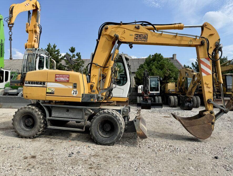 Liebherr A314 - حفار ذو عجلات: صورة 4 Liebherr A314 - حفار ذو عجلات: صورة 4