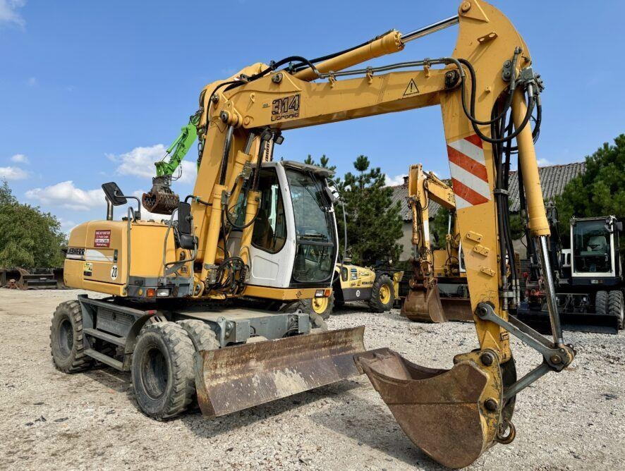 Liebherr A314 - حفار ذو عجلات: صورة 5 Liebherr A314 - حفار ذو عجلات: صورة 5