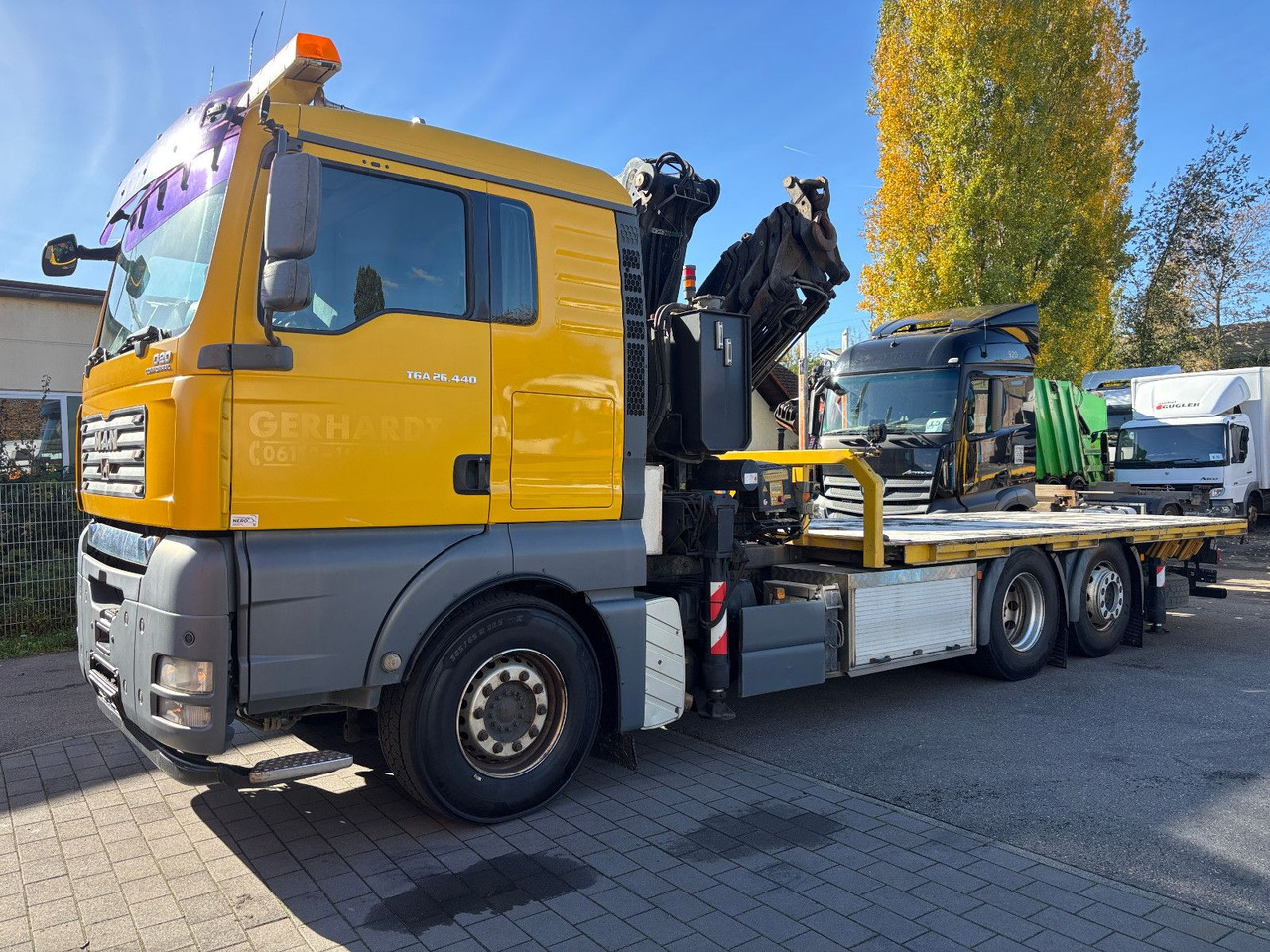 MAN TGA 26.440 FASSI F450AXP Containerauf./Lenkachse - شاحنة كرين: صورة 1 MAN TGA 26.440 FASSI F450AXP Containerauf./Lenkachse - شاحنة كرين: صورة 1