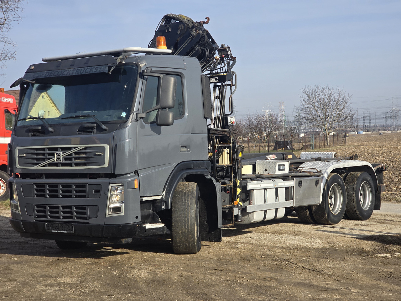 VOLVO FM 380 HOOK SYSTEM / HIAB 166 D2 DUO - شاحنة برافعة خطافية: صورة 1 VOLVO FM 380 HOOK SYSTEM / HIAB 166 D2 DUO - شاحنة برافعة خطافية: صورة 1