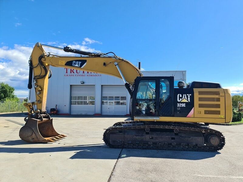 Caterpillar 329E - حفار زاحف: صورة 1 Caterpillar 329E - حفار زاحف: صورة 1