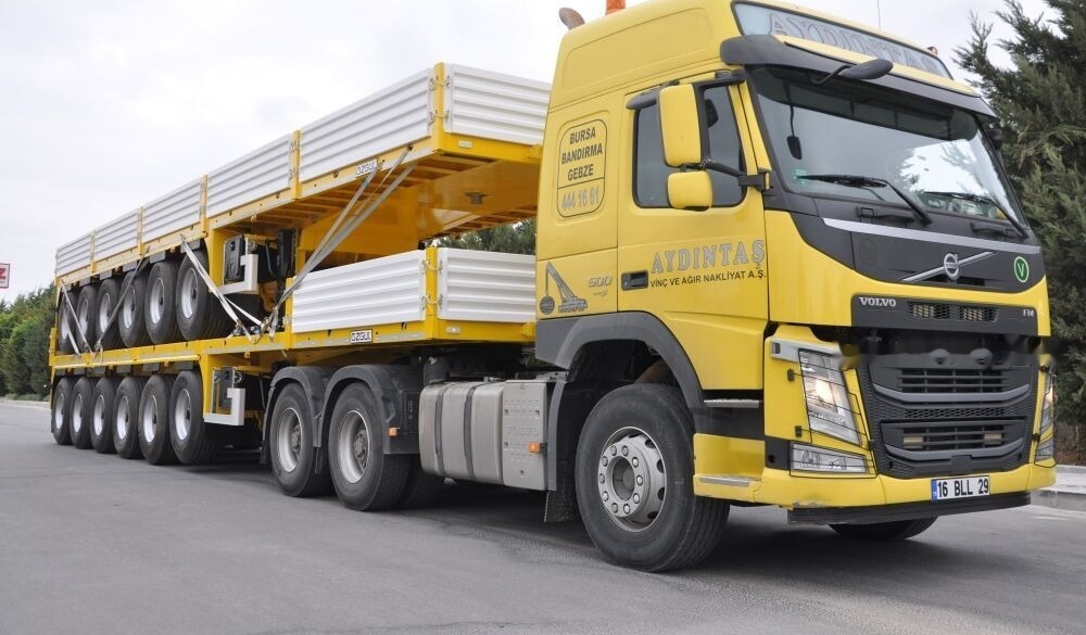 Özgül 6 AXLE PLATFORM SEMI TRAILER - نصف مقطورة مسطحة: صورة 1 Özgül 6 AXLE PLATFORM SEMI TRAILER - نصف مقطورة مسطحة: صورة 1