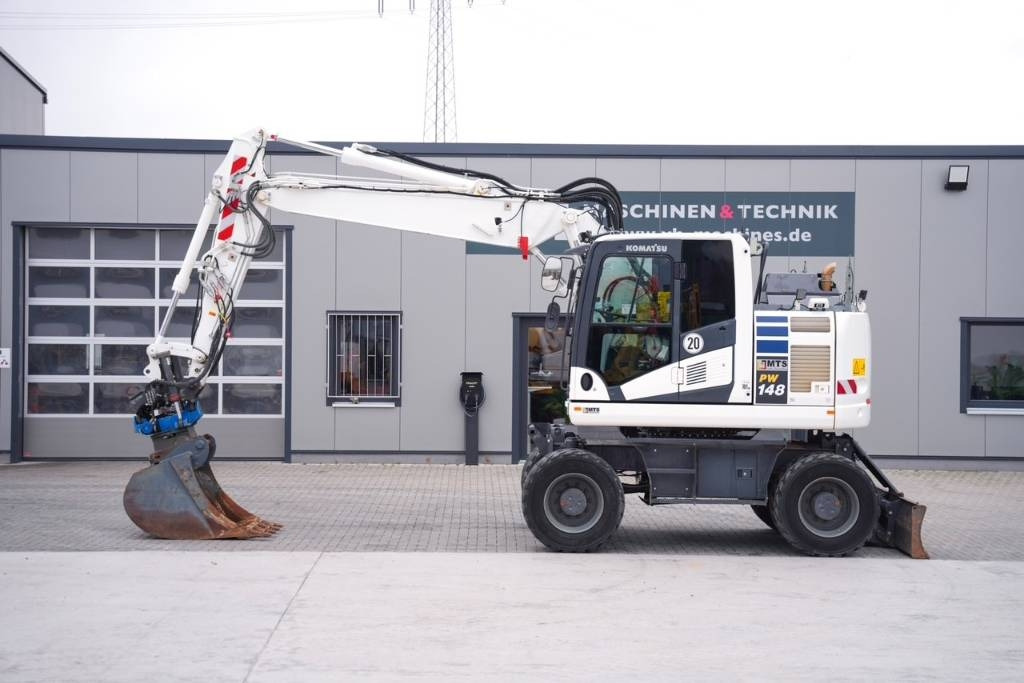 Komatsu PW 148-11 - حفار ذو عجلات: صورة 1 Komatsu PW 148-11 - حفار ذو عجلات: صورة 1