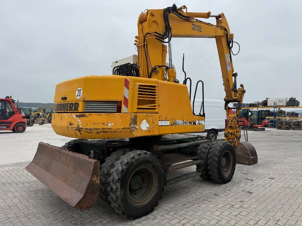 Liebherr A 312 - حفار ذو عجلات: صورة 5 Liebherr A 312 - حفار ذو عجلات: صورة 5