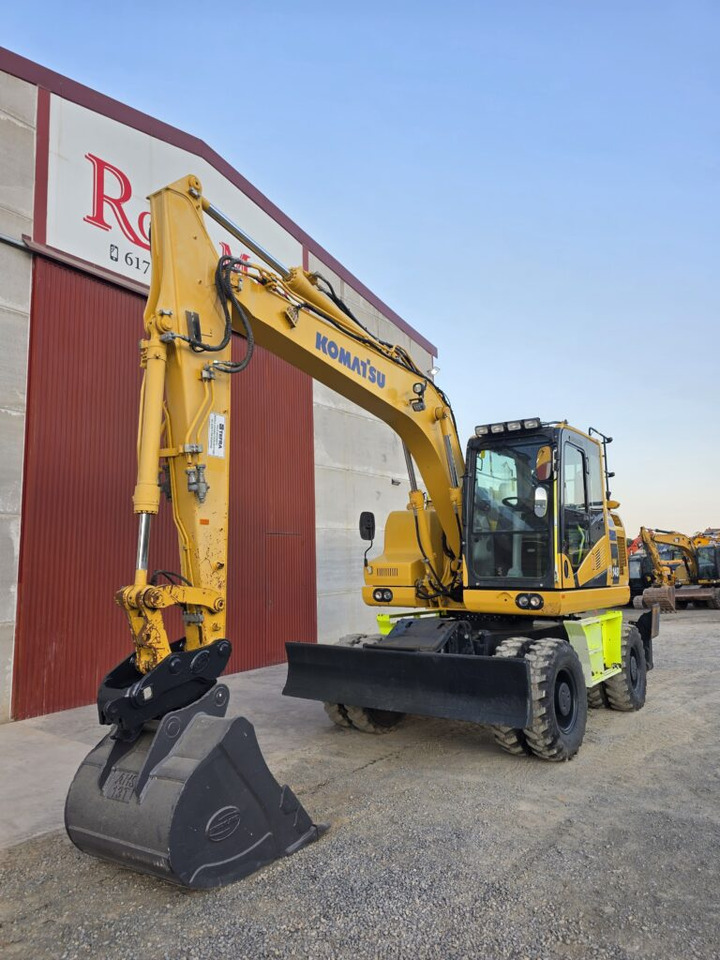 KOMATSU PW148-11 - حفار ذو عجلات: صورة 2 KOMATSU PW148-11 - حفار ذو عجلات: صورة 2