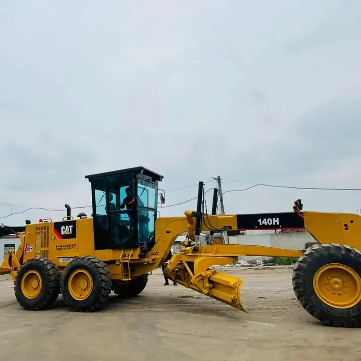 Caterpillar Used Cat Motor Grader 140h With Original Japan Cat Engine For Sale In Shanghai - ماكينة تسوية: صورة 1 Caterpillar Used Cat Motor Grader 140h With Original Japan Cat Engine For Sale In Shanghai - ماكينة تسوية: صورة 1
