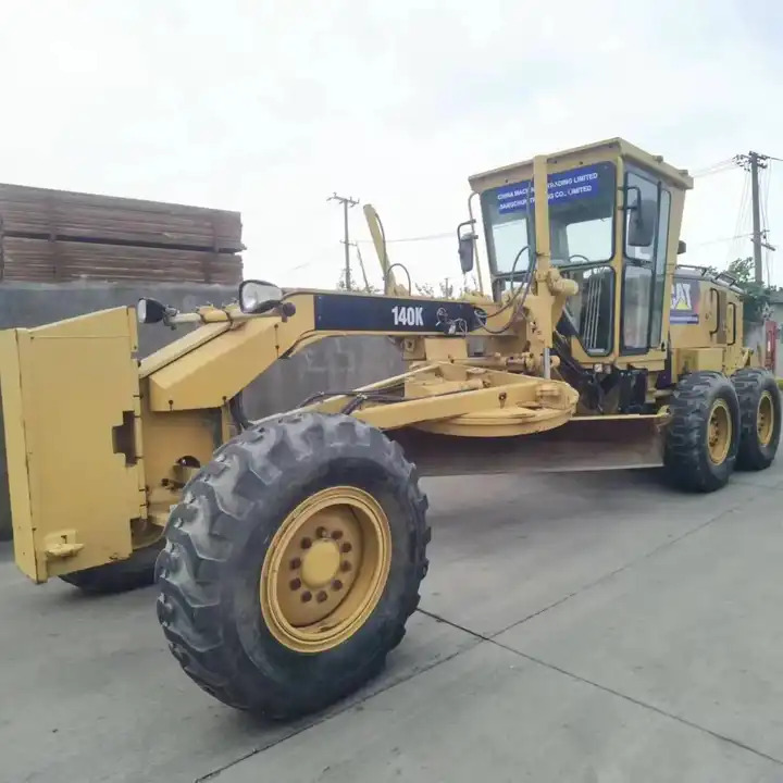 High Quality New Caterpillar Motor Grader Cat 140k Good Price With 1 Year Quality Warranted In Shanghai - ماكينة تسوية: صورة 1 High Quality New Caterpillar Motor Grader Cat 140k Good Price With 1 Year Quality Warranted In Shanghai - ماكينة تسوية: صورة 1