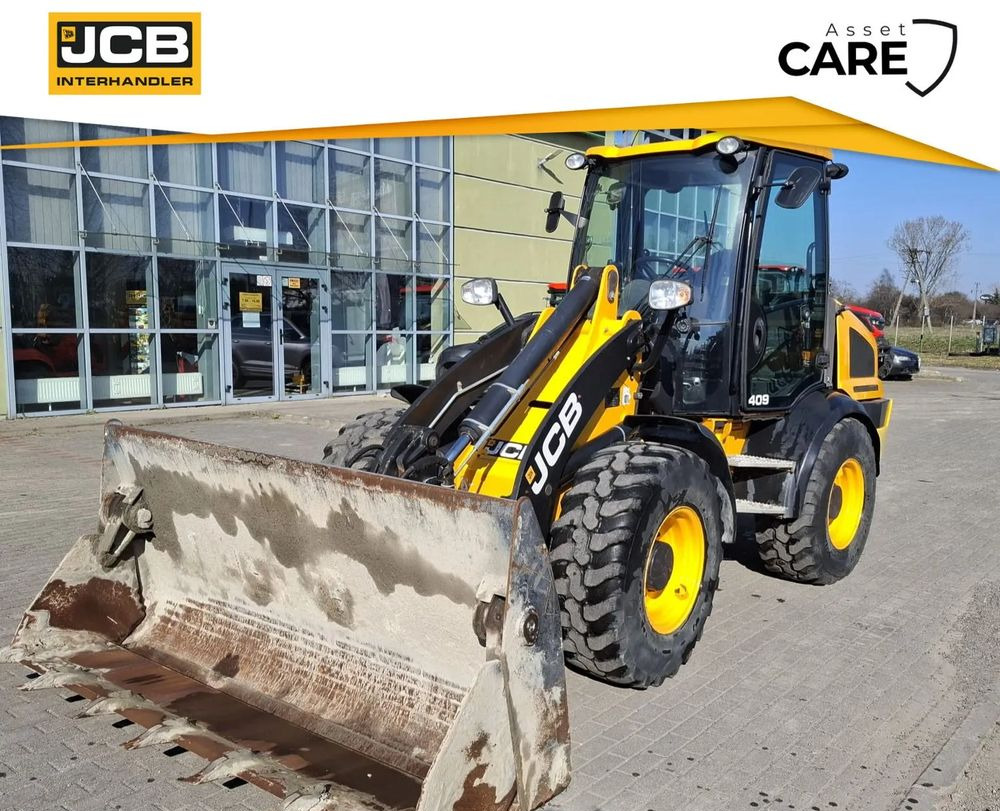 JCB 409 - حفار ذو عجلات: صورة 1 JCB 409 - حفار ذو عجلات: صورة 1