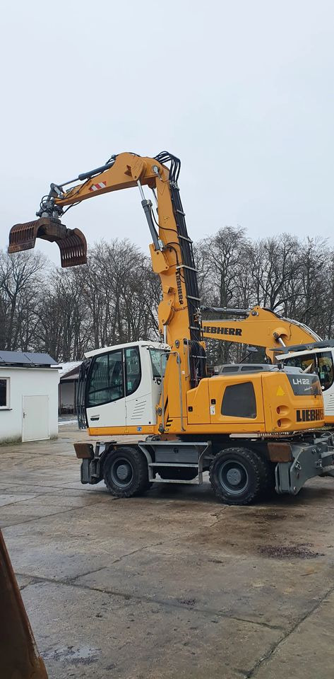 Liebherr LH22 M - حفار ذو عجلات: صورة 2 Liebherr LH22 M - حفار ذو عجلات: صورة 2
