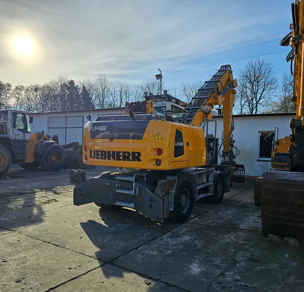 Liebherr LH22 M - حفار ذو عجلات: صورة 1 Liebherr LH22 M - حفار ذو عجلات: صورة 1
