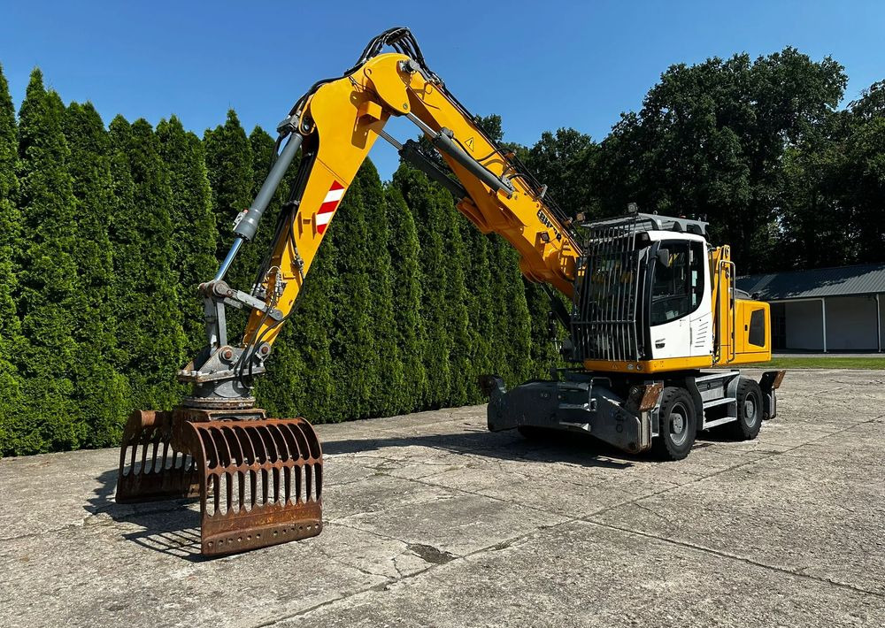 Liebherr LH22 M - حفار ذو عجلات: صورة 4 Liebherr LH22 M - حفار ذو عجلات: صورة 4