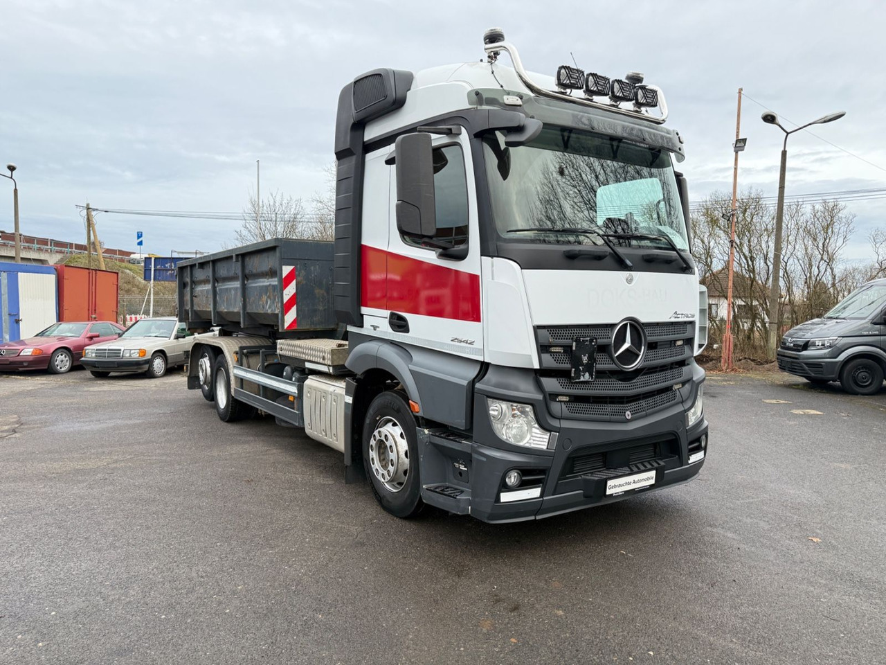 Mercedes-Benz Actros 2542 Abrollkipper mit Container - شاحنة برافعة خطافية: صورة 1 Mercedes-Benz Actros 2542 Abrollkipper mit Container - شاحنة برافعة خطافية: صورة 1