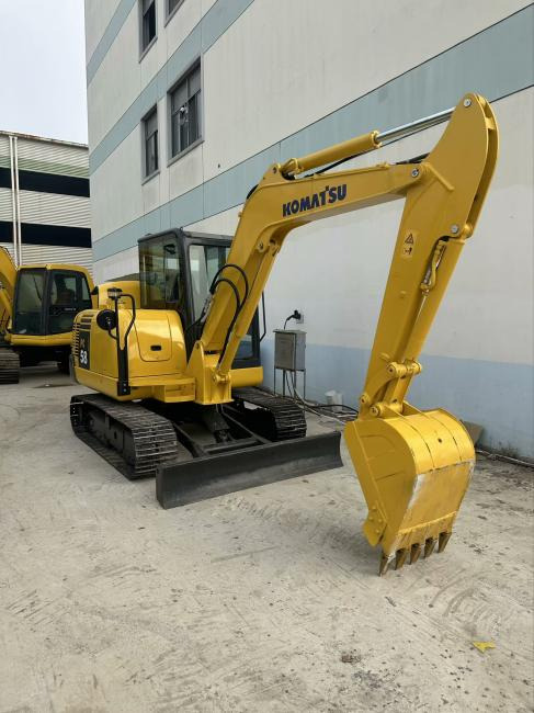 Komatsu PC56 - حفار صغير: صورة 1 Komatsu PC56 - حفار صغير: صورة 1