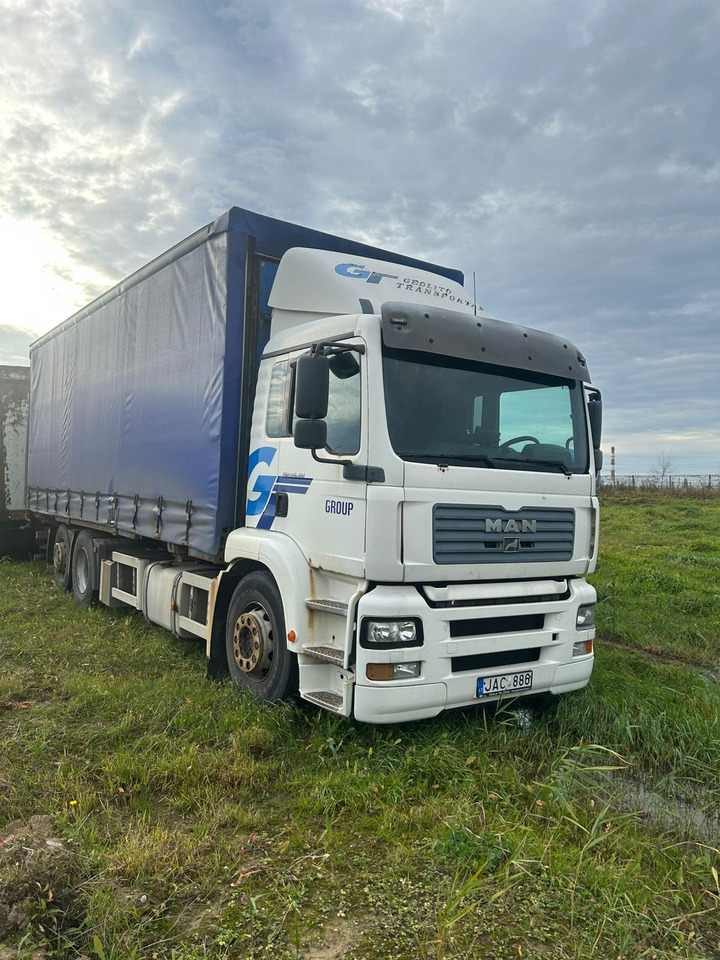 MAN TGA 26.310 - شاحنة ذات ستائر جانبية: صورة 1 MAN TGA 26.310 - شاحنة ذات ستائر جانبية: صورة 1