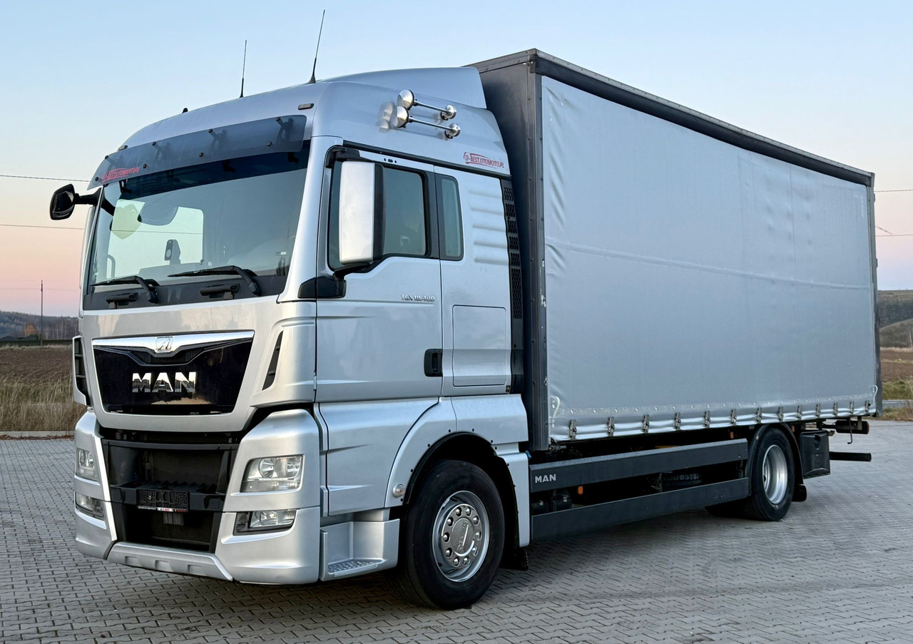 MAN TGX 18.400 / FIRANKA / KONTENER / NISKI PRZEBIEG / EURO 6 / AUTOMAT / SYPIALKA / 2016 ROK - شاحنة ذات ستائر جانبية: صورة 2 MAN TGX 18.400 / FIRANKA / KONTENER / NISKI PRZEBIEG / EURO 6 / AUTOMAT / SYPIALKA / 2016 ROK - شاحنة ذات ستائر جانبية: صورة 2