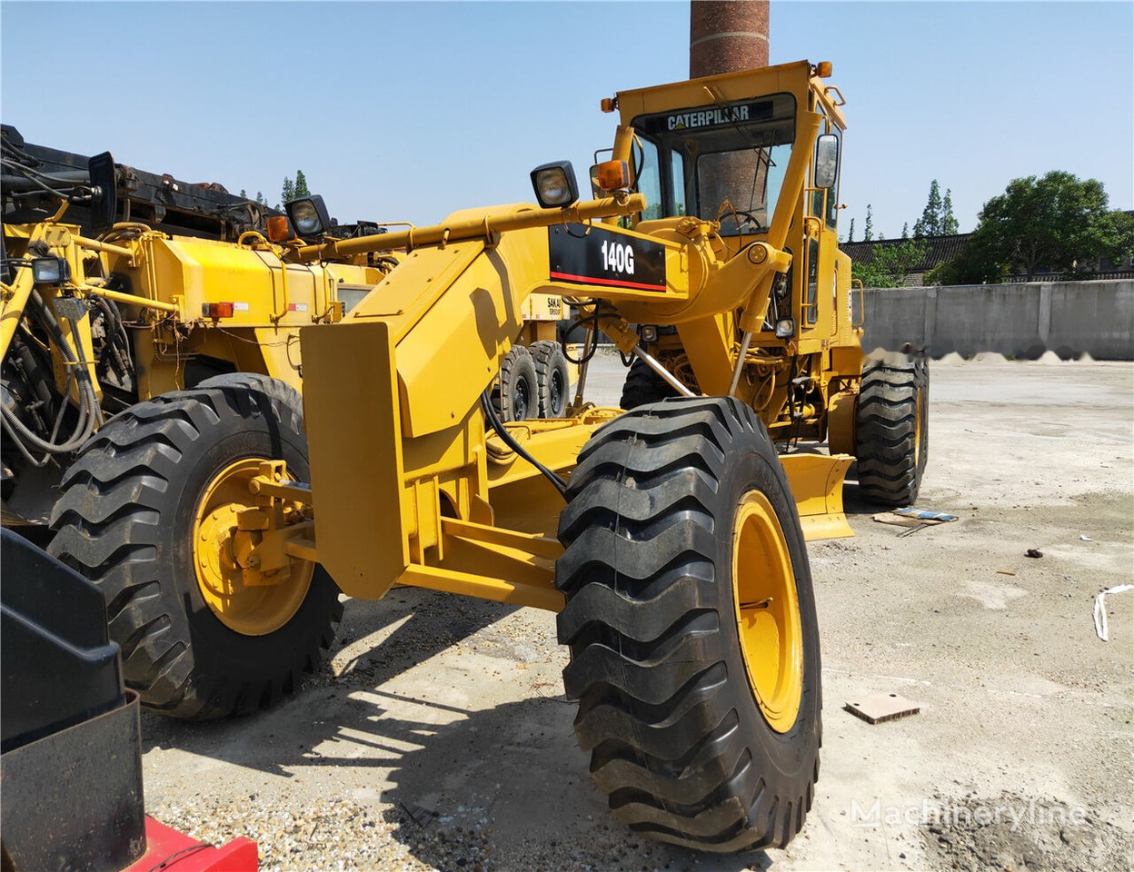 Caterpillar 140G - ماكينة تسوية: صورة 1 Caterpillar 140G - ماكينة تسوية: صورة 1