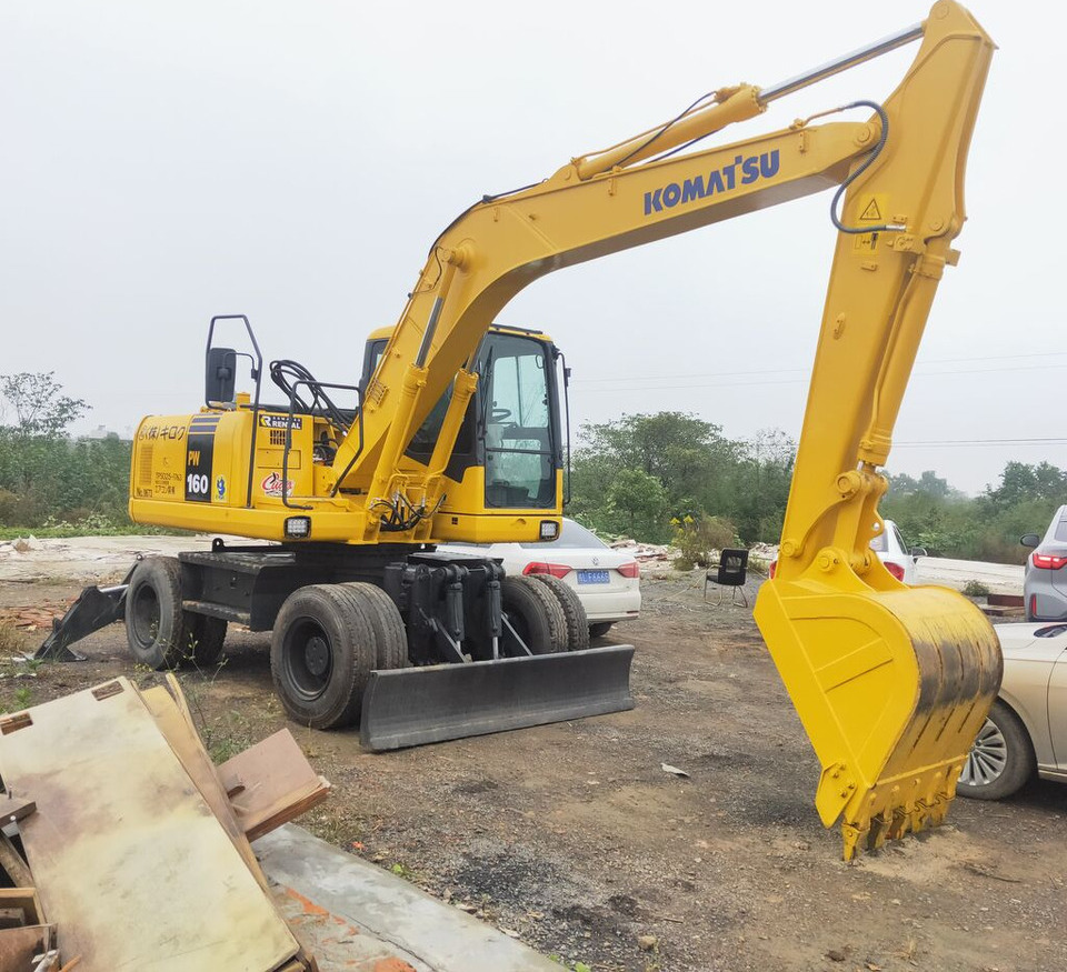 Komatsu PW160 - حفار زاحف: صورة 1 Komatsu PW160 - حفار زاحف: صورة 1