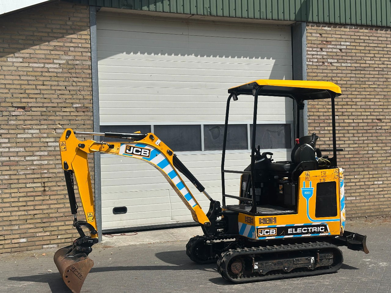 JCB 19c-1 E 100 elektrisch - حفار صغير: صورة 1 JCB 19c-1 E 100 elektrisch - حفار صغير: صورة 1