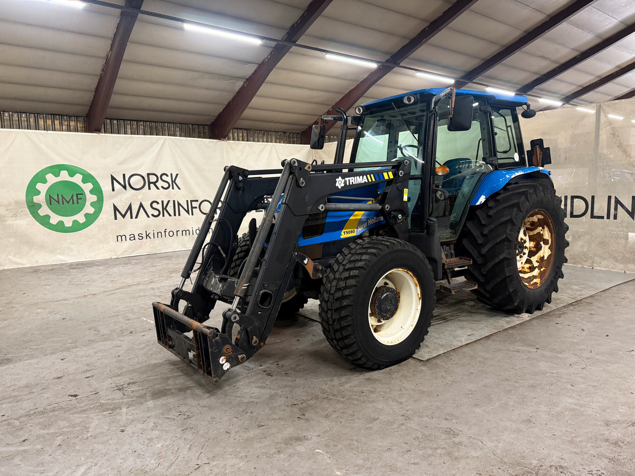 New Holland T5060 - جرار: صورة 1 New Holland T5060 - جرار: صورة 1