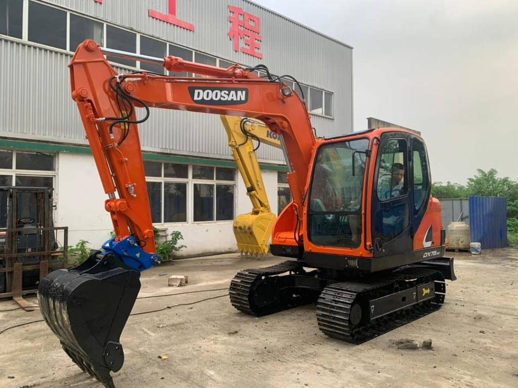 Doosan DX 75-9 C - حفار صغير: صورة 1 Doosan DX 75-9 C - حفار صغير: صورة 1
