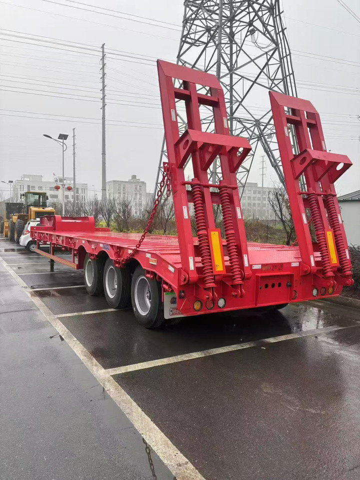 نصف مقطورة بلودر منخفض للبيع ZHICHENG Semni Flat Bed Low Bed Floater with 3 Axles 4 Axles New or Used 12M 13.75M In High Quality: صورة 7 نصف مقطورة بلودر منخفض للبيع ZHICHENG Semni Flat Bed Low Bed Floater with 3 Axles 4 Axles New or Used 12M 13.75M In High Quality: صورة 7