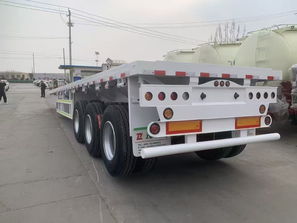 نصف مقطورة بلودر منخفض للبيع ZHICHENG Semni Flat Bed Low Bed Floater with 3 Axles 4 Axles New or Used 12M 13.75M In High Quality: صورة 23 نصف مقطورة بلودر منخفض للبيع ZHICHENG Semni Flat Bed Low Bed Floater with 3 Axles 4 Axles New or Used 12M 13.75M In High Quality: صورة 23
