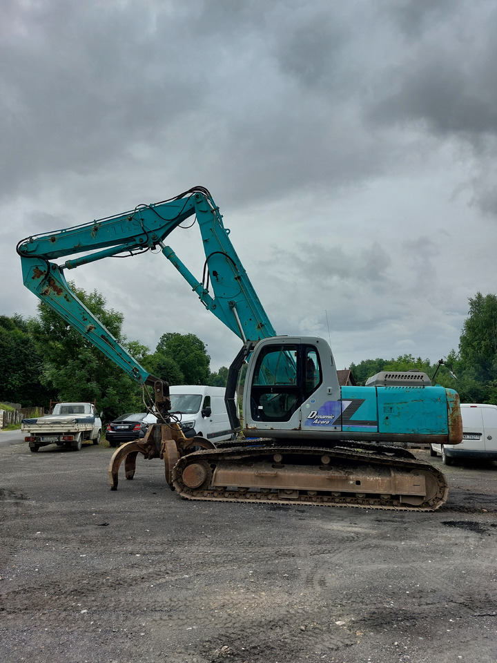 KOBELCO SK220 - آلة التعامل مع النفايات: صورة 3 KOBELCO SK220 - آلة التعامل مع النفايات: صورة 3