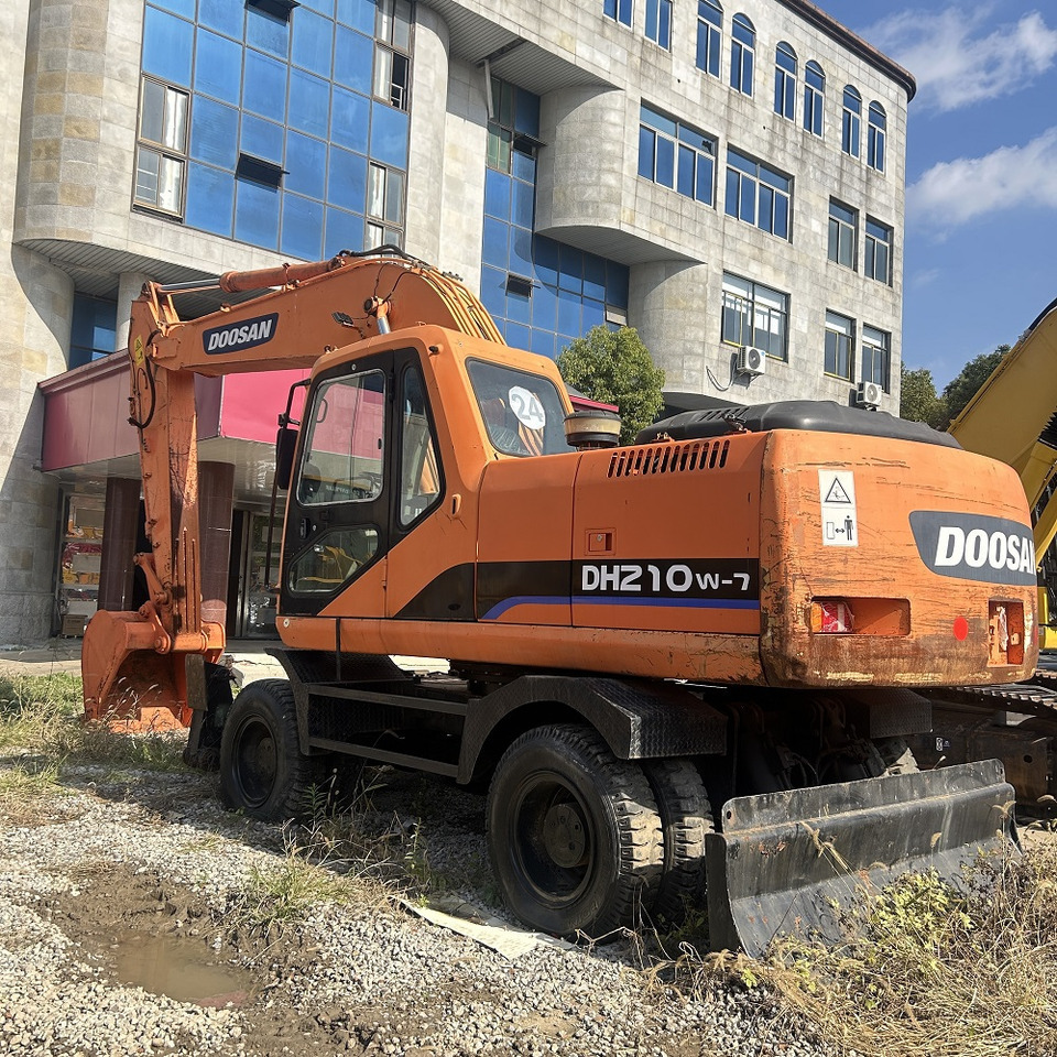 Doosan DH210w-7 wheel excavator - حفار ذو عجلات: صورة 1 Doosan DH210w-7 wheel excavator - حفار ذو عجلات: صورة 1