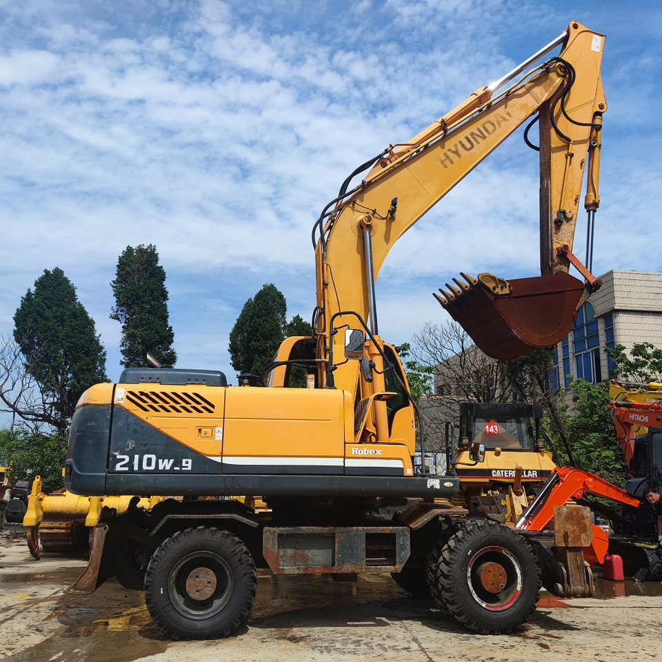 Hyundai 210w-9 wheel excavator - حفار ذو عجلات: صورة 4 Hyundai 210w-9 wheel excavator - حفار ذو عجلات: صورة 4