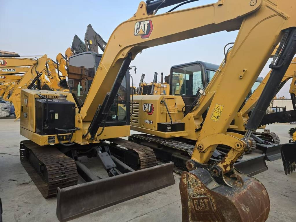 CAT 306 - حفار صغير: صورة 1 CAT 306 - حفار صغير: صورة 1