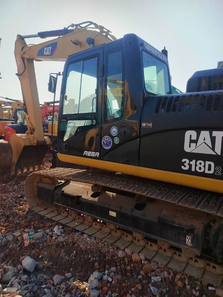 CAT 318 - حفار زاحف: صورة 1 CAT 318 - حفار زاحف: صورة 1
