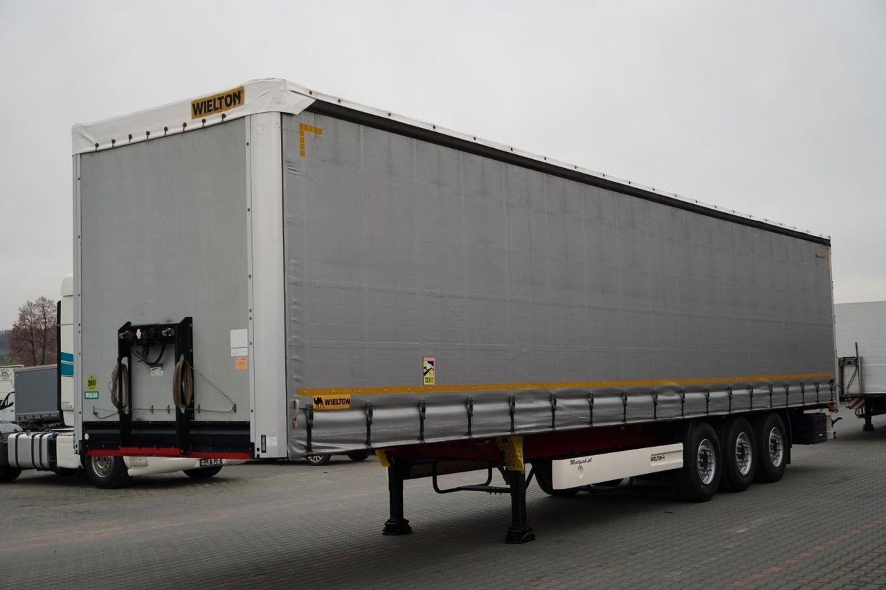 Wielton FIRANKA STANDARD / MULDA DO STALI - 9 M / OŚ POD - نصف مقطورة بستائر جانبية: صورة 1 Wielton FIRANKA STANDARD / MULDA DO STALI - 9 M / OŚ POD - نصف مقطورة بستائر جانبية: صورة 1