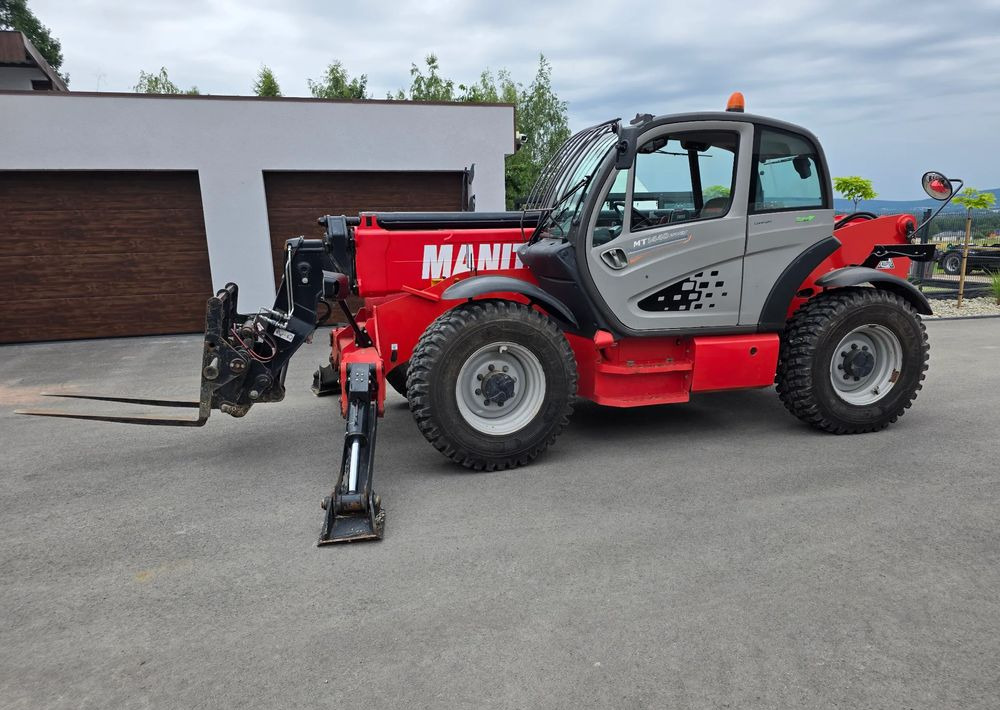 Manitou MT 1440 EASY - آلة رفع ونقل تلسكوبية: صورة 1 Manitou MT 1440 EASY - آلة رفع ونقل تلسكوبية: صورة 1
