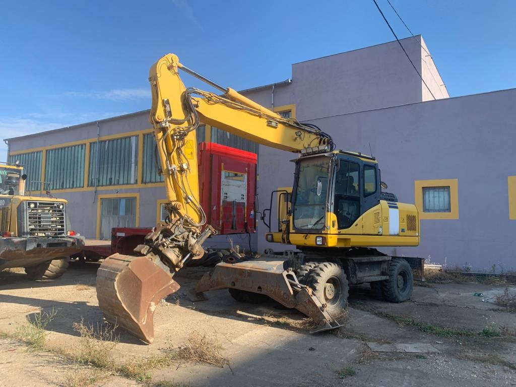 Komatsu PW180-E0+Engcon Rototilt - حفار ذو عجلات: صورة 1 Komatsu PW180-E0+Engcon Rototilt - حفار ذو عجلات: صورة 1