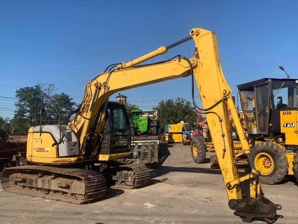 New Holland E 135 SR - حفار زاحف: صورة 1 New Holland E 135 SR - حفار زاحف: صورة 1