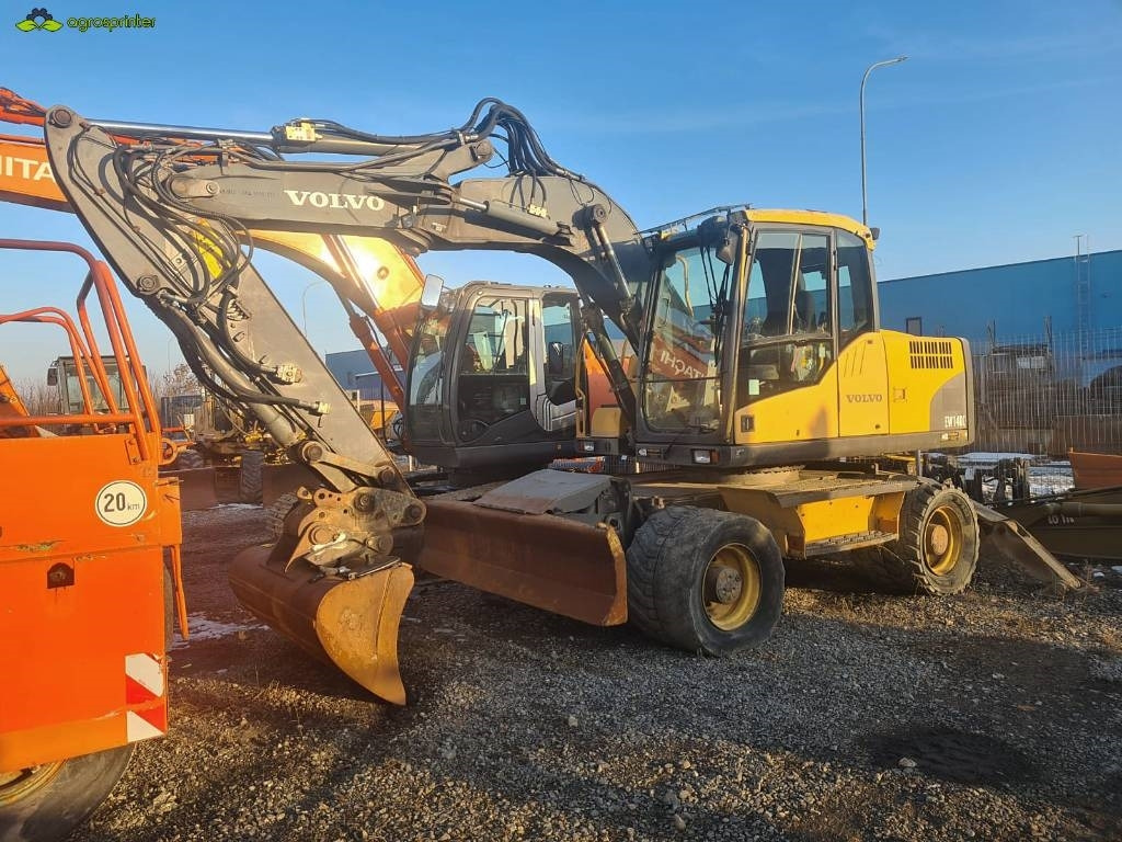 Volvo EW 140 C - حفار ذو عجلات: صورة 1 Volvo EW 140 C - حفار ذو عجلات: صورة 1