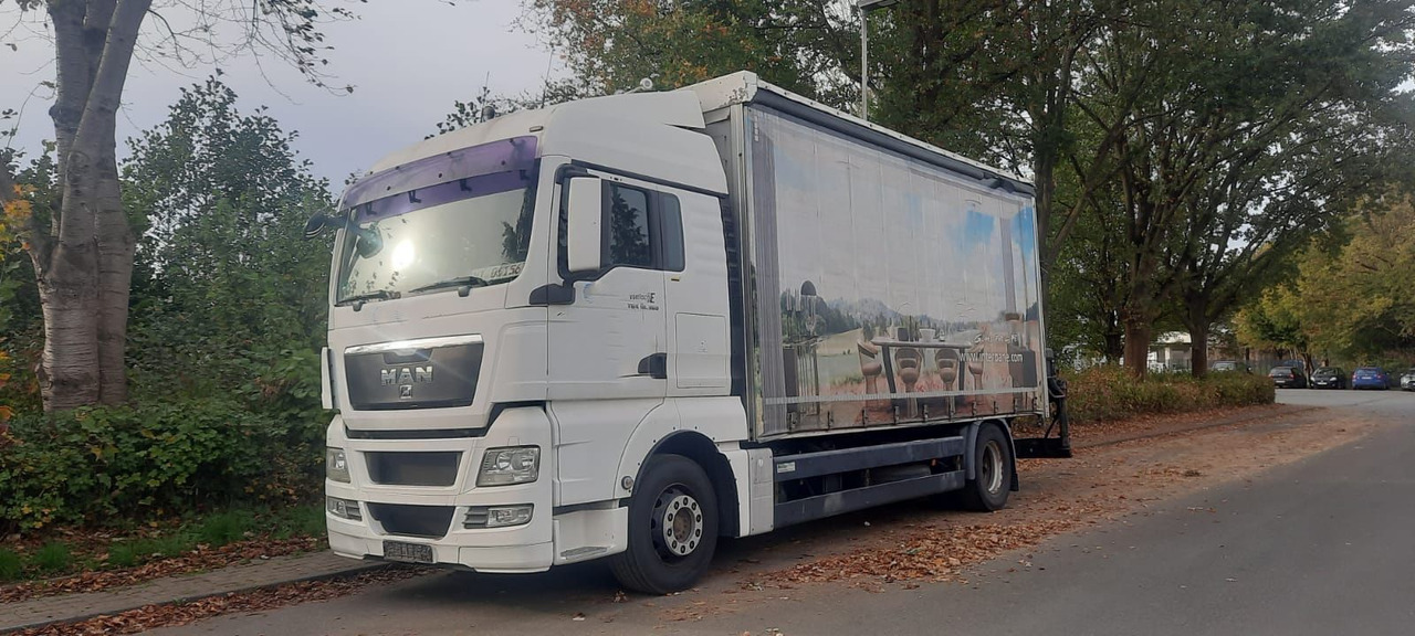 MAN TGX 18.360PS 4x2 G.Haus Kran+Funk - شاحنات مسطحة, شاحنة كرين: صورة 1 MAN TGX 18.360PS 4x2 G.Haus Kran+Funk - شاحنات مسطحة, شاحنة كرين: صورة 1