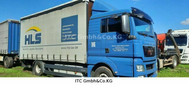 MAN TGX18.400 Pritsche Plane - شاحنة ذات ستائر جانبية: صورة 1 MAN TGX18.400 Pritsche Plane - شاحنة ذات ستائر جانبية: صورة 1