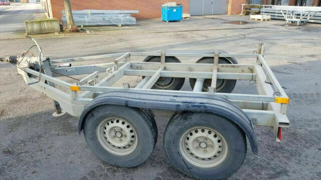 Trebbiner Abrollanhänger/Absetzer - مقطورة: صورة 1 Trebbiner Abrollanhänger/Absetzer - مقطورة: صورة 1