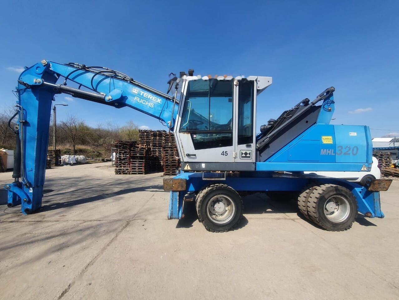 Fuchs MHL 320 D MZS - آلة التعامل مع النفايات: صورة 1 Fuchs MHL 320 D MZS - آلة التعامل مع النفايات: صورة 1
