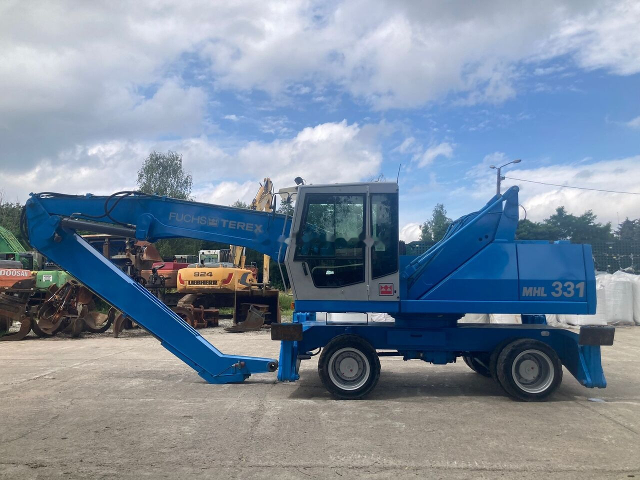 Fuchs MHL 331 C with Generator - آلة التعامل مع النفايات: صورة 1 Fuchs MHL 331 C with Generator - آلة التعامل مع النفايات: صورة 1