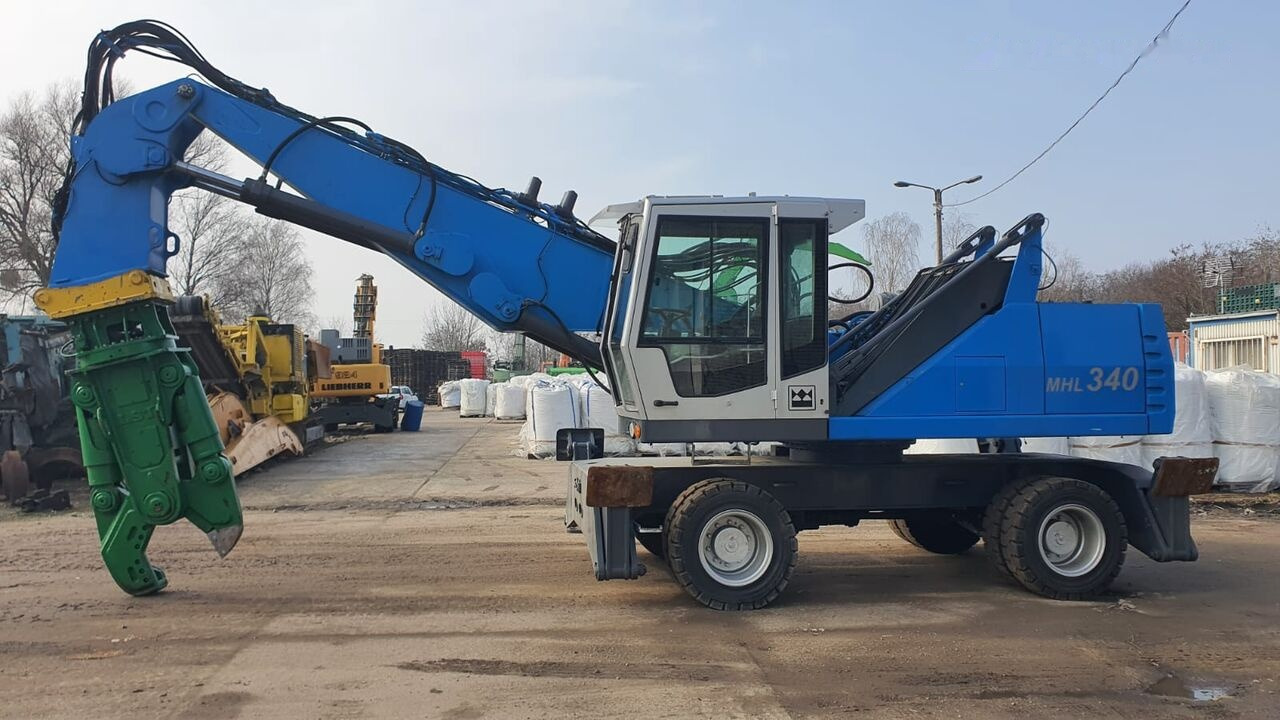 Fuchs MHL 340D FQC + LST 3to shear - آلة التعامل مع النفايات: صورة 1 Fuchs MHL 340D FQC + LST 3to shear - آلة التعامل مع النفايات: صورة 1