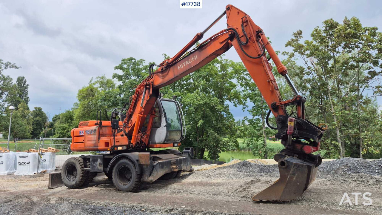 HITACHI EW 165W (2000) ROTOTILT Wheel Excavator - حفار ذو عجلات: صورة 1 HITACHI EW 165W (2000) ROTOTILT Wheel Excavator - حفار ذو عجلات: صورة 1