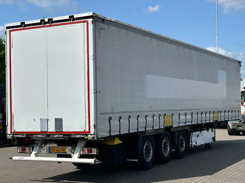 Krone SD Schuifzeil -Dak / SAF Disc / Huckepack / Apk! - نصف مقطورة بستائر جانبية: صورة 1 Krone SD Schuifzeil -Dak / SAF Disc / Huckepack / Apk! - نصف مقطورة بستائر جانبية: صورة 1