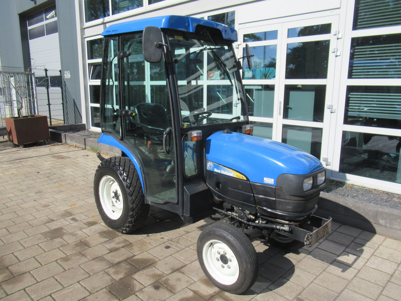 New Holland TC21D 4WD 4x4 Cabine Verwarming - جرار: صورة 5 New Holland TC21D 4WD 4x4 Cabine Verwarming - جرار: صورة 5
