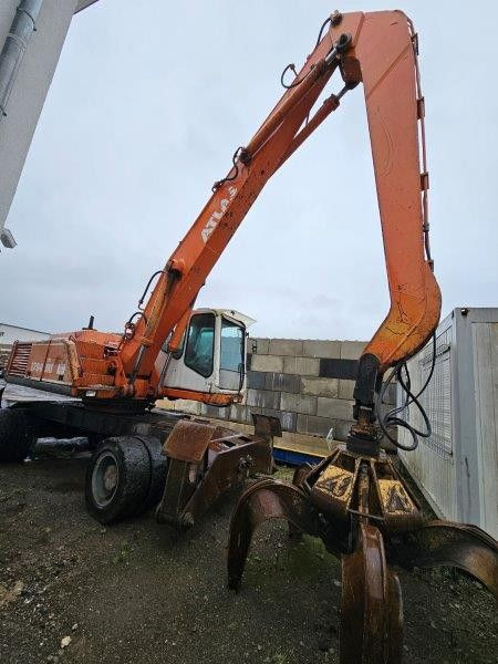 Atlas 1704 MI mit Greifer Umschlagbagger Lang - حفار ذو عجلات: صورة 1 Atlas 1704 MI mit Greifer Umschlagbagger Lang - حفار ذو عجلات: صورة 1