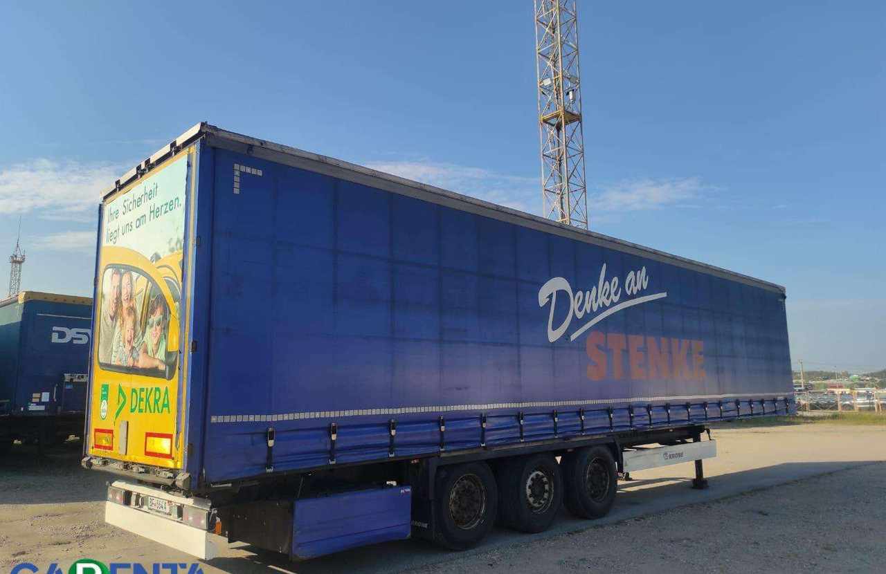 Krone S D - نصف مقطورة بستائر جانبية: صورة 1 Krone S D - نصف مقطورة بستائر جانبية: صورة 1